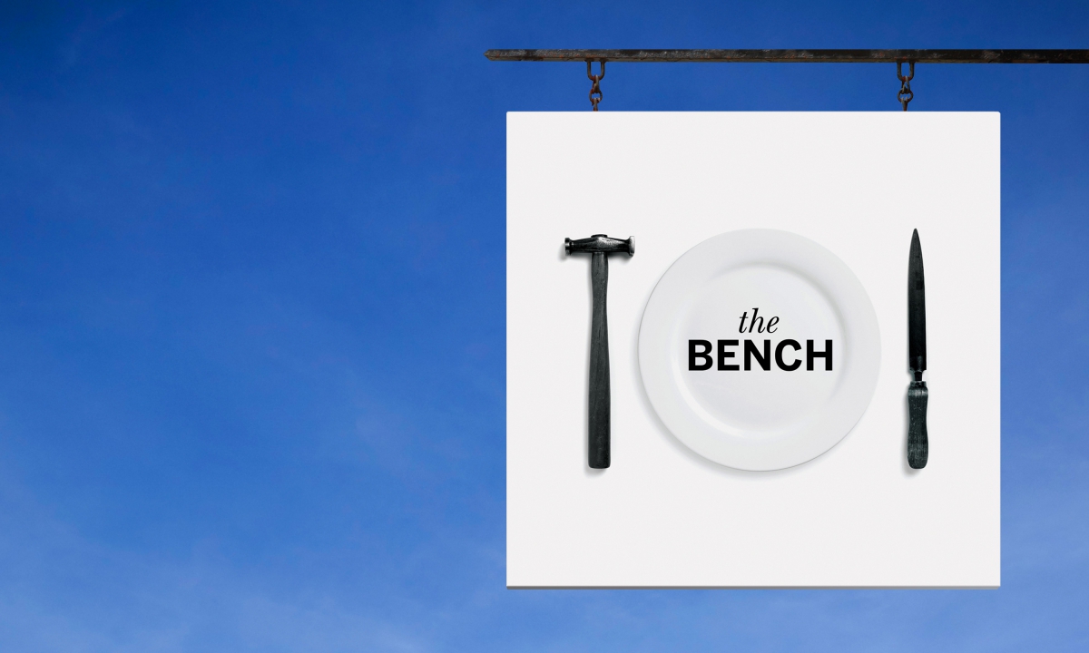 By Dana Robertson Creative Director and Founder of Neon. The Bench café brand identity, signage. As part of Neon's wider involvement in this ground-breaking development, we were asked to name and create the brand identity for The Goldsmiths’ Centre’s new café. The aim was to provide a friendly and inspiring environment in which members of the silversmithing trade, patrons, partners and the visiting public could relax and rub shoulders, helping to forge a flourishing creative community. The name we came up with — The Bench — was a reference to both heritage (the silversmith’s classic workbench) and the informal ambience of the café itself. The Bench café brand identity also celebrated silversmithing heritage, replacing cutlery with classic silversmithing tools – selected from world renowned silversmith Grant MacDonald’s studio. The Bench café brand identity was rolled out on signage, uniforms, crockery, literature, and environmental graphics. – Idea, art direction and design by Neon Design & Branding Consultancy www.neon-creative.com