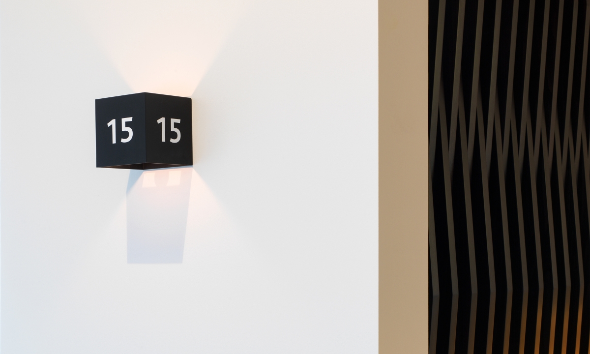 Branding by Neon - Nabarro Law Firm - 125 London Wall Lift Light and room number designed by Dana Robertson