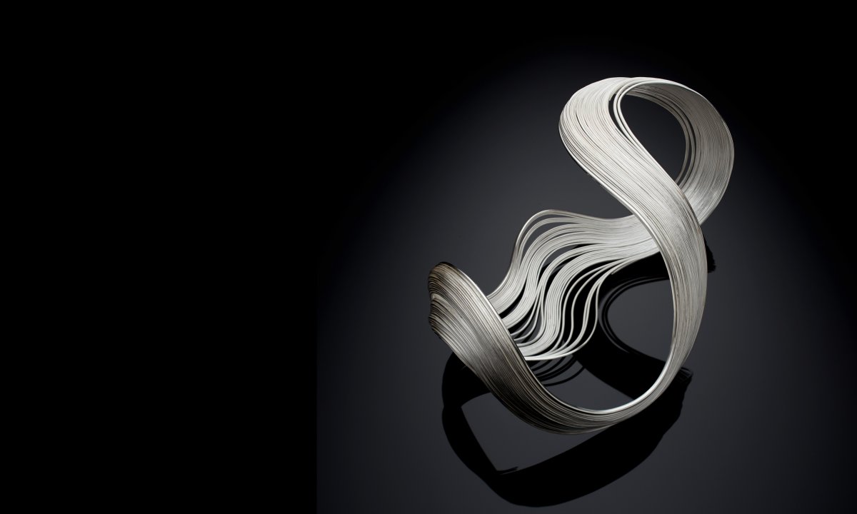 Silver Speaks exhibition signature graphic part of the branding scheme created by Neon